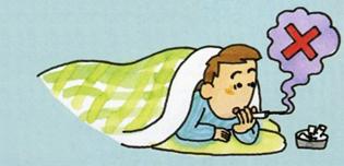 布団に入ってタバコを吸っている男性にバツ印がついているイラスト