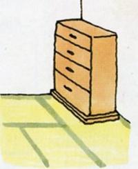 家具の下に小さな板を差し込んで固定しているイラスト